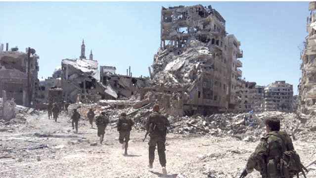 LOS REBELDES SE RINDEN A LAS TROPAS DE ASSAD EN HOMS