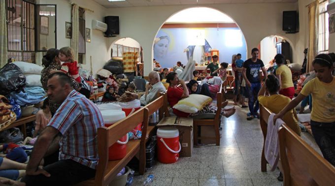 20150907 iglesia refugiados