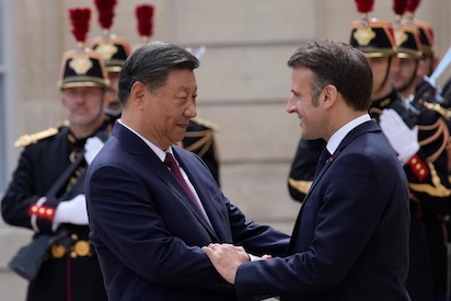 MACRON Y XI