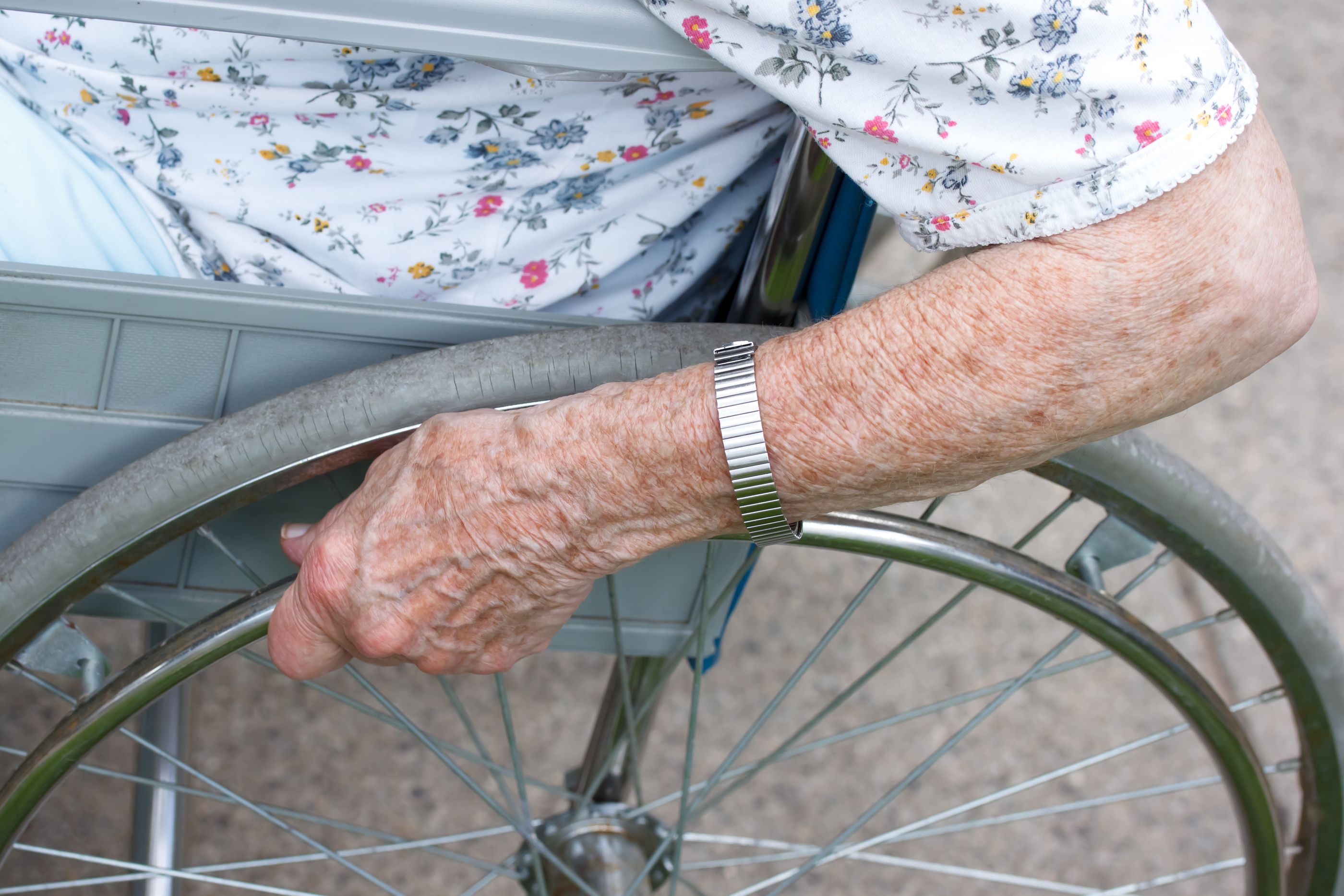 bigstock senior s hand on wheel of whee 21520769